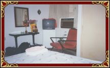  This is the small bedroom, but it's very well furnished.
As you can see it has TV, minibar and air conditioner.  