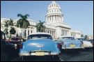  This is a side view of El Capitolio and the tipical old cars that you will find in the streets of Havana. 