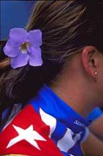 Cuban girl wearing the Cuban flag.