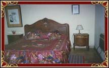  This is the small room with double bed and air conditioner.  