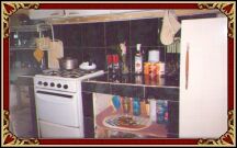 This is the kitchen with refrigerator.