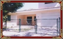  Entrance from the street to the house Maria. 