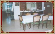  This is the well furnished dining room. You can share the rest of the house with the house owners.